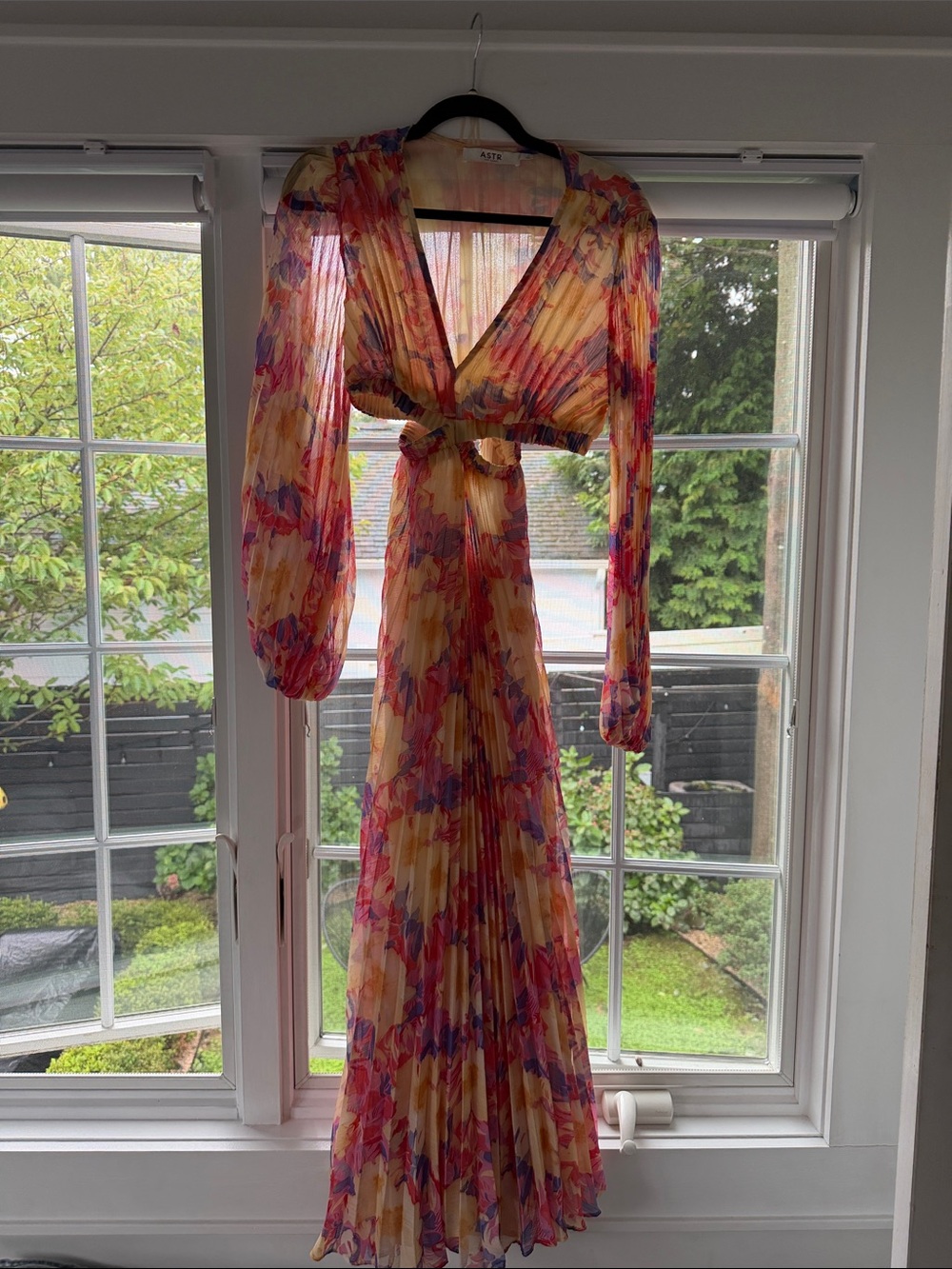 ASTR  floral long sleeve dress with side cut outs and open back